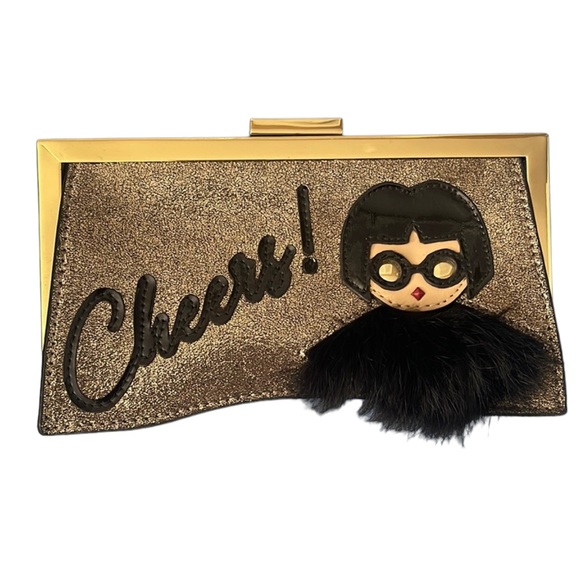 Trina Turk Handbags - Trina Turk CHEERS clutch.  Adorable. Pocket inside. Very different.